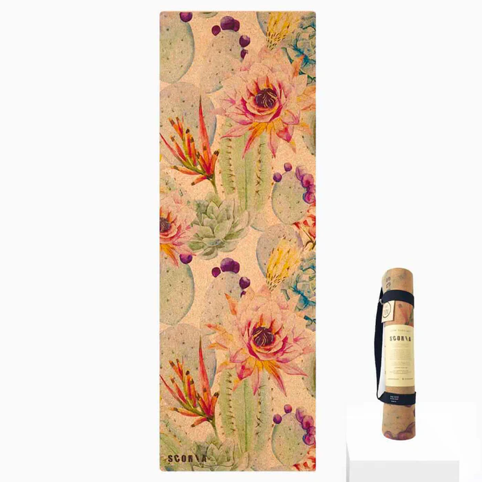 cork yoga mat with colourful plant design against white background