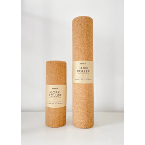 two sizes of cork rollers against grey background