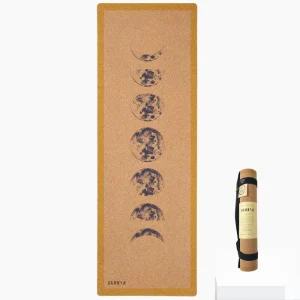 cork yoga mat with lunar phase design on white background