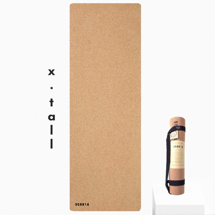 cork yoga mat on white background with marketing description for extra tall use