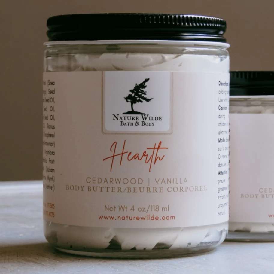 4 oz jar containing whipped butter with Nature Wilde logo and product description of hearth body butter